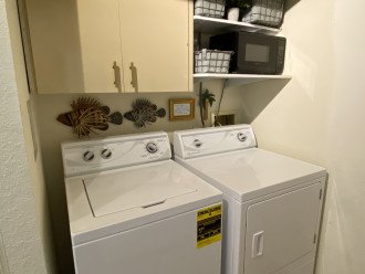Convenient kitchen laundry. Full sized machines!