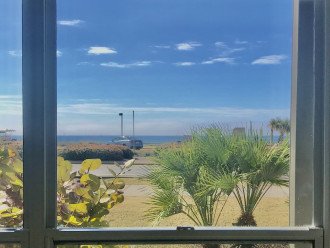 View of the Gulf from inside Villa 3B (downstairs) and James Lee Park.
