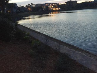 Quaint walkway by villas. Lake is great for kids to feed turtles. No fishin