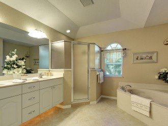 Master en-suite with double vanities, shower & garden tub
