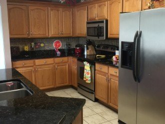 Kitchen with stainless appliances and granite countertops