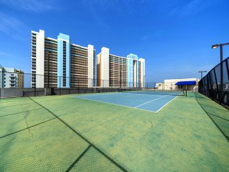 Tennis courts atop parking garage