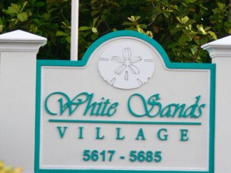 Welcome to White Sands, your building is 5683 Midnight Pass Road