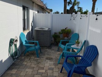 New privacy fence provides perfect courtyard for relaxing with dtinks.