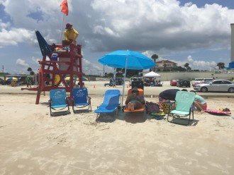 We provide the chairs, cooler, towels, toys. Lifeguard provides peace of mind.