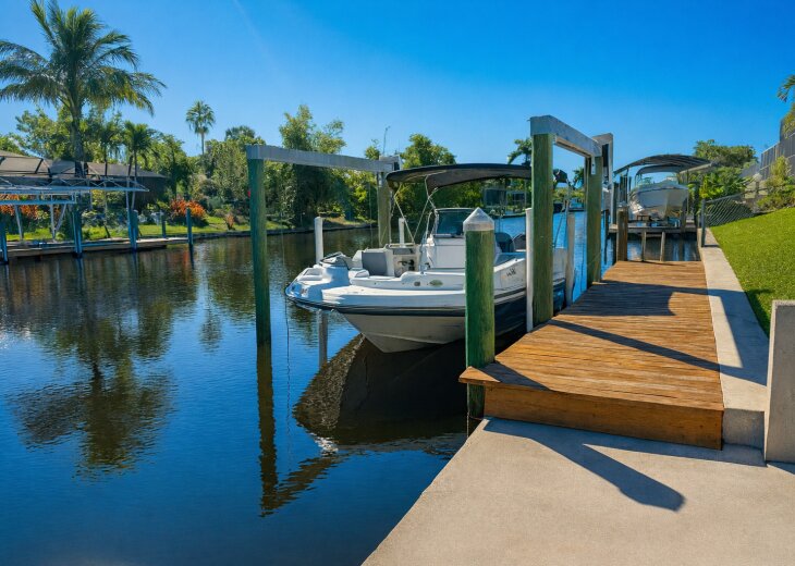Waterfront stay with private dock, boat lift, and calm canal views