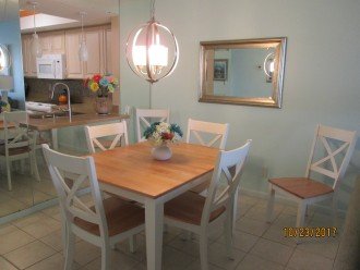Dining room, kitchen beyond