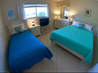 2nd Bedroom with Queen and Twin Beds overlooking Bay