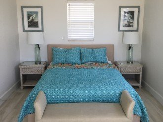 Renovated bedroom with gulf view through patio doors