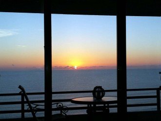 Quiet sunrise overlooking the ocean from the wrap around balcony