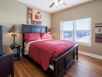 1st guest bedroom with queen size bed is spacious and relaxing with awesome views of the Emerald Coast