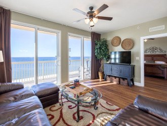 Spacious living area with walk-out balcony & excellent views of the Gulf & beach, Large flat screen TV