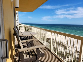 Extra large balcony with view of the morning sun reflecting on the Emerald Coast to the East