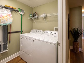 Laundry room with full size washer and dryer. Throw in a load and head to the beach