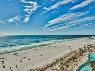 View to the west includes the beautiful sky, emerald coast, white sand beach & the City Pier