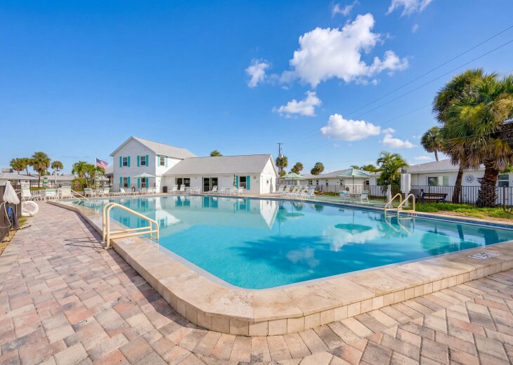 The large heated community pool is perfect for a refreshing swim or a relaxing afternoon in the Florida sunshine.