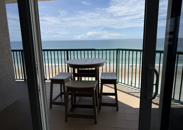 Comfortable Counter Height Table and Chairs on Balcony