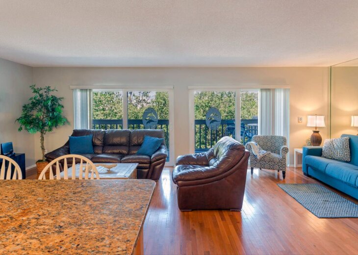 Open living area with sliders to the balcony