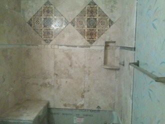 New Bathroom going in Travertine Stone and Custom Tiles..Walk-in shower