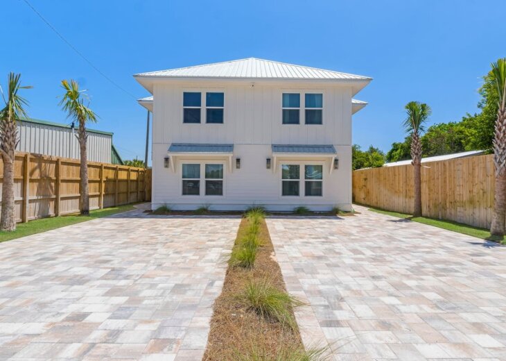 Enjoy the spacious 4 bedroom duplex (unit is on the right) or book the additional unit on the left and have both homes right for all your family and friends to enjoy!