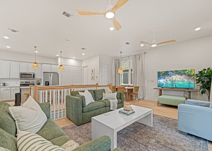 A spacious living room located upstairs in the home