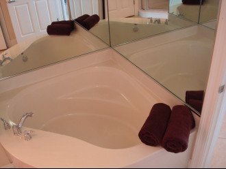 Extra large soaking tub in the master bath...loose yourself in a bit of luxury