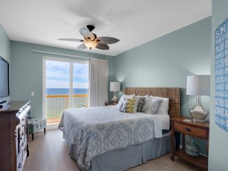 The master bedroom w/ king size bed, Gulf views and direct access to the balcony