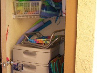 Storage Closet with chairs, cart, toys and more