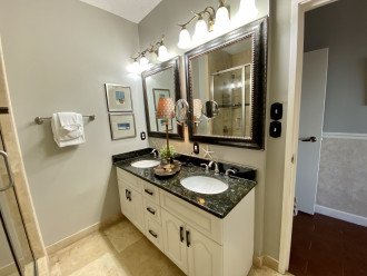 Master Batihroom with large shower and his and hers sink