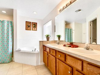 Main bathroom with separate shower and bathtub