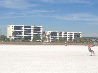 Condo from the beach - look at that white sand!