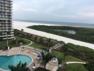 View from balcony overlooking pool, beach and Gulf