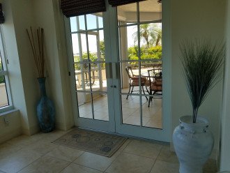 Grand exit to the expansive lanai and outdoor terrace (with hot tub).