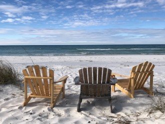 Adirondack chairs off the dune walkover overlooking the Gulf