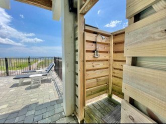 Outdoor Hot/Cold Shower with boardwalk to the beach to the left -June 2022