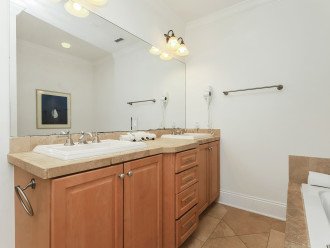 Bath with dual sinks and jetted tub