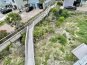 Avalon has an attached boardwalk to the beach - 175 feet