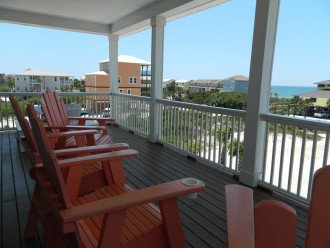 Living deck has very nice andirondack captains chairs