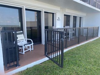 Balcony with access to grassed area, pool and beach. No need for elevators