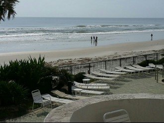 view of beach from pool deck