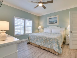 Master bedroom with 55' smart tv and bath