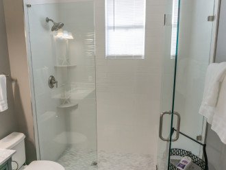 european seemless glass shower doors on all baths. ( 2nd floor queen suite)