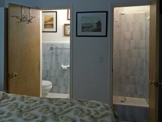 second bedroom with bathroom and shower
