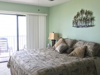 Master Bedroom with access to balcony. Listen to the waves at nite.