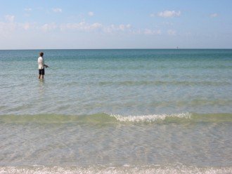Crystal clear waters welcome you to the Gulf of Mexico, 5 min walk away