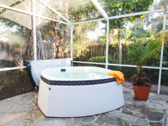 Soak in the privacy of our hot tub surrounded by tropical gardens