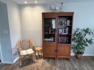 Reading area in living room. Enjoy books, games, and puzzles provided.