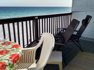 MBR deck over beach w/chaise, bar stools, dining table, umbrella, drinks table