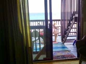 Ground floor apt. beach deck w/steps down to the sand deck and out to the Gulf