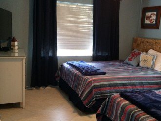 2nd upstairs bedroom with 2 queen beds, flat screen with DVD, Cable &smart apps